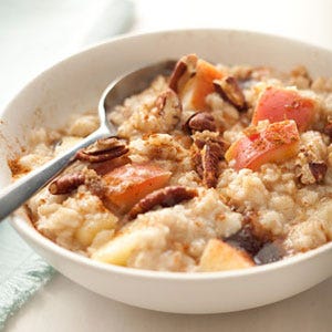 <p>Instead of simply topping oatmeal with fruit, this recipe cooks apple slices within it, allowing them to break down and infuse the grains with bright flavor and texture. Pecans, brown sugar and cinnamon sweeten the deal.</p><p><b>Recipe:</b> <a href="http://gogonow.org/recipefinder/oatmeal-apples-pecans-cinnamon-recipe-122828%22%3E%3Cb%3EOatmeal with Apples, Pecans and Cinnamon</b></a></p>
