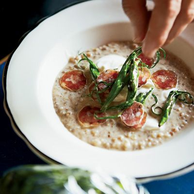 <p>The idea for this hearty, risotto-style soup came to Frédéric Morin while he was sitting on a combine in his uncle's barley field. He could smell the peat from the neighboring farm, which reminded him of Scotch whisky. </p>
<p><strong>Recipe: <a href="http://www.delish.com/recipefinder/barley-soup-scotch-recipe-fw1011" target="_blank">Barley Soup with Scotch</a></strong></p>