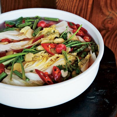 <p>David Chang's quick "white" version of kimchi uses 7UP, an unexpected ingredient that adds lovely bubbliness to the cabbage. It can be served as a side dish like traditional red chile kimchi or with cold noodle soup.</p><p><b>Recipe: </b><a href="/recipefinder/sparkling-white-kimchi-recipe-fw0311" target="_blank"><b>Sparkling White Kimchi</b></a></p>