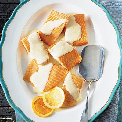 Salmon with Tangerine-Lemon Hollandaise Sauce <p>You can make this brightly flavored citrus sauce, which comes together effortlessly in a blender, up to an hour in advance; keep it warm in a heatproof bowl set over a pan of simmering water, stirring occasionally.</p><p><b>Recipe:</b> <a href="/recipefinder/salmon-tangerine-lemon-hollandaise-sauce-recipe-mslo0211" target="_blank"><b>Salmon with Tangerine-Lemon Hollandaise Sauce</b></a></p>