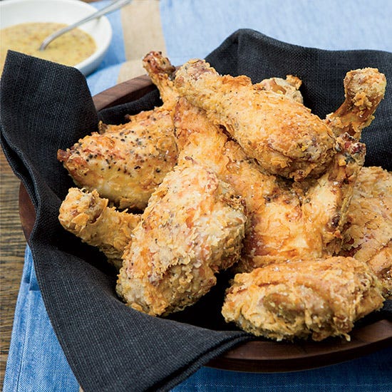 <p>Bobby Flay's crispy fried chicken stays tender and juicy for two reasons: First, the tangy yogurt marinade and second, the fact that the chicken is roasted first, then quick-fried just before serving.</p>

<p><strong>Recipe:</strong> <a href="http://gogonow.org/recipefinder/fried-chicken-honey-mustard-recipe-fw0514%22%3E%3Cstrong%3EFried Chicken with Honey Mustard</strong></a></p>