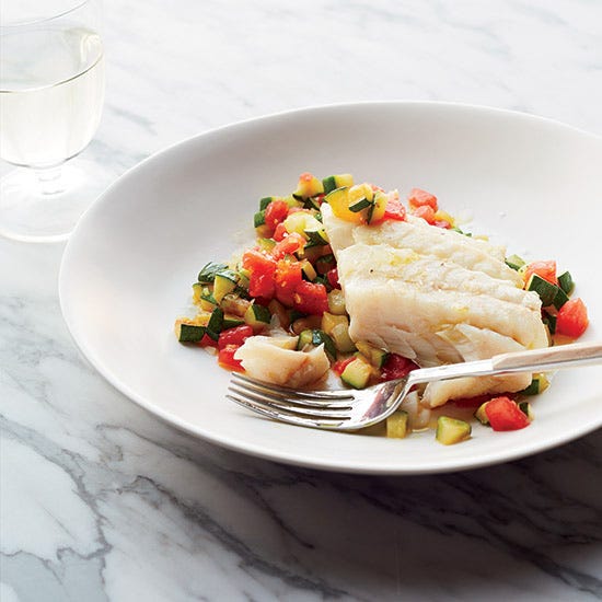 <p>Hake is a member of the same fish family as cod and haddock, and like them, it's white, flaky, lean, and mild. Poaching it slowly in olive oil makes it silky and delicious. Here, it's served on a warm zucchini-and-tomato sautée.</p><p><strong>Recipe:</strong> <a href="http://gogonow.org/recipefinder/broiled-salmon-spinach-feta-saute-recipe-mslo0612%22%3E%3Cstrong%3EOlive Oil-Poached Hake on Sautéed Zucchini with Tomatoes </strong></a></p>
