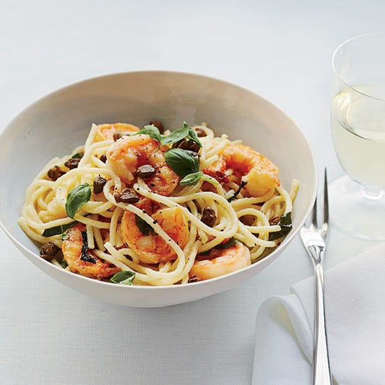 <p>Fried capers add a crisp, pungent hit to De Laurentiis's lovely seafood pasta. The sauce that coats the spaghetti is a simple mix of olive oil, Parmesan, and lemon.</p><p><strong>Recipe:</strong> <a href="http://gogonow.org/recipefinder/lemon-spaghetti-shrimp-recipe-fw0514%22%3E%3Cstrong%3ELemon Spaghetti with Shrimp</strong></a></p>