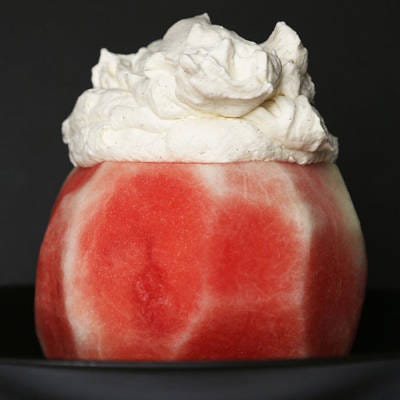 Make vanilla bean whipped cream, and dollop the entire batch on the top of the watermelon.
