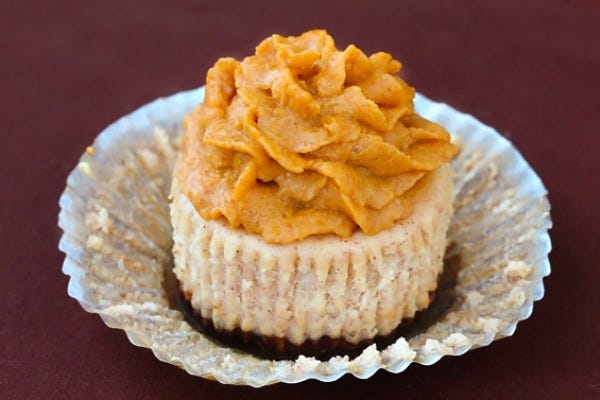 <p>Pumpkin and chocolate cupcakes combine the classic colors and flavors of Halloween.</p> <p><strong>Get the recipe from <a href="http://www.gimmesomeoven.com/cinnamon-mini-cheesecakes-with-pumpkin-pie-frosting/" target="_blank">Gimme Some Oven</a>.</strong></p>