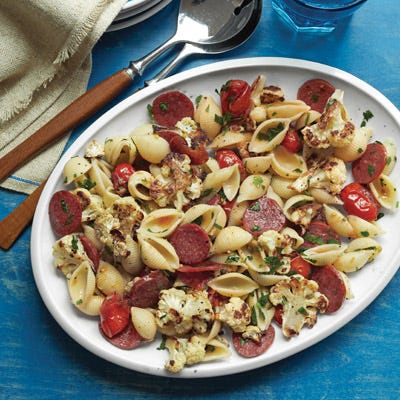 Roasting heightens the sweetness of grape tomatoes and the nuttiness of the cauliflower, which compliments the spicy pepperoni in this food-in-a-flash dinner.

 Recipe: Pasta with Roasted Cauliflower, Tomatoes, and Pepperoni