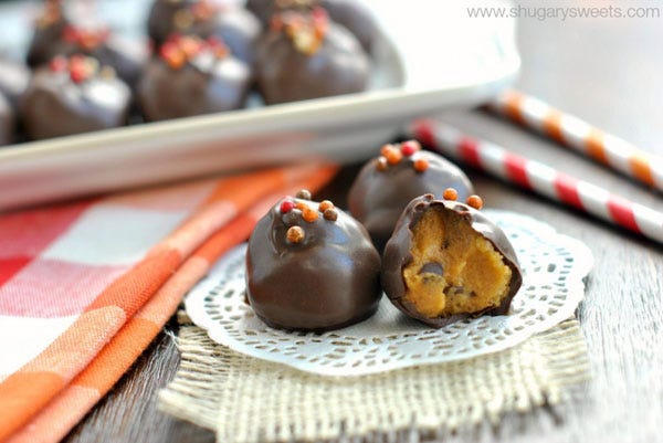 <p> </p> <p><strong>Get the recipe from <a href="http://www.shugarysweets.com/2014/10/pumpkin-chocolate-chip-cookie-dough-truffles" target="_blank">Shugary Sweets</a>.</strong></p>