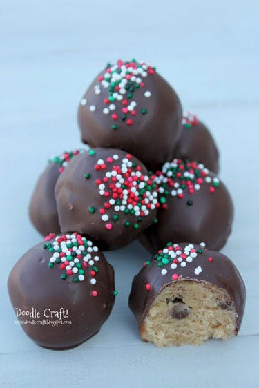 <p> </p> <p><strong>Get the recipe from <a href="http://www.doodlecraftblog.com/2013/12/cookie-dough-truffles-and-holiday-baking.html" target="_blank">Doodlecraft</a>.</strong></p>
