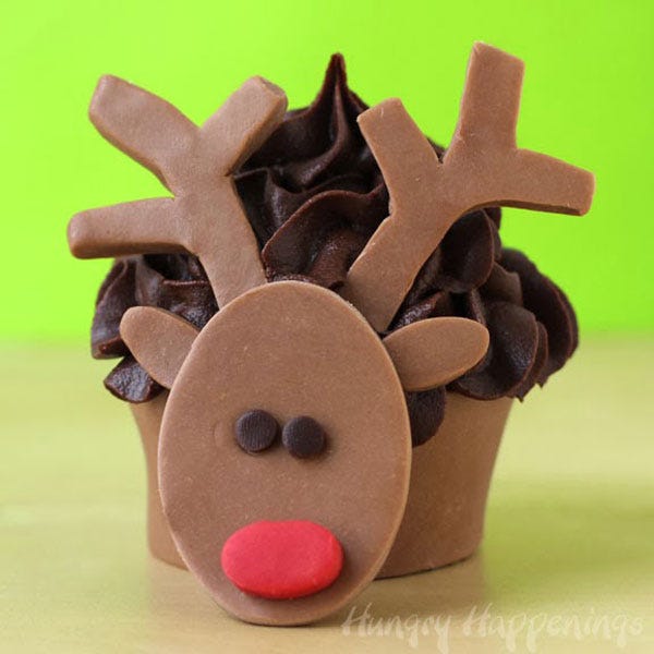 <p><br /><strong>Get the recipe from <a href="http://www.hungryhappenings.com/2013/12/Christmas-chocolate-Rudolph-cupcake-wrappers.html" target="_blank">Hungry Happenings</a>.</strong></p>