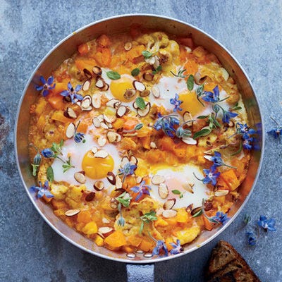 <p>Cookbook author and blogger Heidi Swanson of 101 Cookbooks poaches eggs in a yellow-tomato sauce over sweet, caramelized cauliflower steaks.</p>
<p><strong>Recipe: <a href="http://gogonow.org/recipefinder/smothered-cauliflower-eggs-recipe-fw0813%22 target="_blank">Smothered Cauliflower with Eggs</a></strong></p>