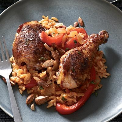 For her sublime version of everyday chicken and rice, Kiesel coats chicken legs in chili powder and cooks rice with <i>sofrito,</i> a Spanish mixture of chopped onion, garlic, and bell pepper. She bakes everything together in a skillet so that the delectable chicken juices flavor the rice, then broils the dish at the last minute to turn the chicken skin enticingly brown.<br /><br />
<b>Recipe:</b> <a href="/recipefinder/chicken-sofrito-recipe"target="_new">Chicken Sofrito</a>