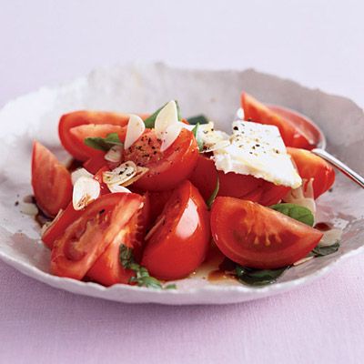 <p>Ripe, red Roma tomatoes need little adornment to shine in the barbecue lineup. Here, they are dressed with feta, fresh basil, and vinaigrette in classic Mediterranean style.</p><br /><p><b>Recipe: <a href="/recipefinder/roma-tomato-salad-feta-garlic-recipe" target="_blank">Roma Tomato Salad with Feta and Garlic</a> </b></p>