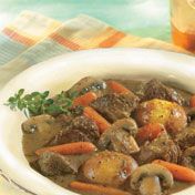 A host of savory herbs season this hearty stew featuring beef, mushrooms, carrots and potatoes all simmered in rich beef stock.  It takes just 15 minutes to put together the ingredients, then it simmers on the stove while you tend to other things.