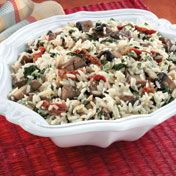 Plain risotto is good, but our version, flavored with sautéed mushrooms, sun-dried tomatoes and spinach is truly delectable.