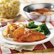 This speedy sautéed chicken dish features a delicious tomato sauce flavored with basil and Parmesan cheese.