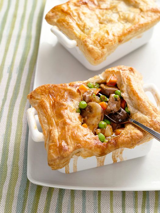 Golden puff pastry covers a hearty stew-like mixture of beef, mushrooms, and veggies in these individual-sized pot pies.
<br /><br />
<b><a href="http://www.redbookmag.com/recipefinder/steak-mushroom-pot-pie-recipe"target="_new">Get the recipe!</a></b>