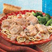 Hot linguine is topped with a creamy tomato and mushroom sauce that is studded with chunks of tender white fish to make this luscious and satisfying fish dish.