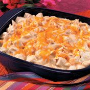 Chicken, tortillas and cheese are layered with a creamy chile-spiked sauce and baked until bubbling hot.