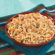 Chock full of chicken, carrots and green onion, this creamy rice dish is made special with a mixture of Campbell's{{{reg}}} Condensed Cream of Mushroom with Roasted Garlic Soup, Campbell's{{{reg}}} Condensed Chicken Broth and Parmesan cheese.