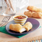 Here's a great way to dress up mozzarella sticks...just try this baked version that uses golden puff pastry as the "breading".  You'll find that the melted mozzarella together with the flaky pastry is a delectable combination.