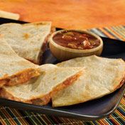 All you need is 20 minutes and four ingredients to make these tasty quesadillas, oozing with melted cheese and flavored with picante sauce and green chiles.