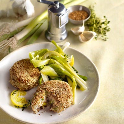 <p>These amazing little salmon cakes start with canned Alaskan salmon and canola mayonnaise, both superior sources of omega-3s, include leeks and metabolism-boosting pepper, and are rolled in cholesterol-lowering sesame seeds before sautéing. Mild, aromatic, and healthful leeks vinaigrette — a classic French dish — are served alongside.</p><br /><br /><p><b>Recipes:<br /><a href="/recipefinder/salmon-cakes-recipe" target="_blank">Salmon Cakes</a><br /><a href="/recipefinder/leeks-vinaigrette-recipe" target="_blank">Leeks Vinaigrette</a></b></p>
