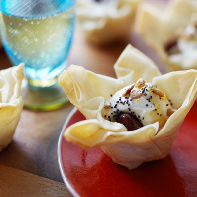 <b>Submitted by: <a href="/rf/user/roachrl/recipebook" target=
"_blank">roachrl </a></b>  <br /><br />Roachl says: "Creamy goat cheese in a flaky phyllo cup is topped with a drizzle of citrus honey, and seeds for presentation. The surprise is a smoked almond hidden underneath the goat cheese."<br /><br />
<b>Recipe: <a href="/recipefinder/Silver-Screen-Seeded-C8BDDD4612D511DFAD75C803318EDE76" target="_blank">Silver Screen Seeded Surprise Goat Cheese Cups with Drizzled Orange Honey</a></b>