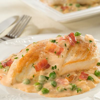 <p>The classic carbonara combo of bacon, onion, and sweet green peas enhance the creamy sauce for this easy chicken dinner. Serve over cooked angel hair pasta to soak up the savory sauce.</p><br /><p><b>Recipe:</b> <a href="/recipefinder/chicken-carbonara-rosa-recipe-btl0810" target="_blank"><b>Chicken Carbonara Rosa</b></a></p>