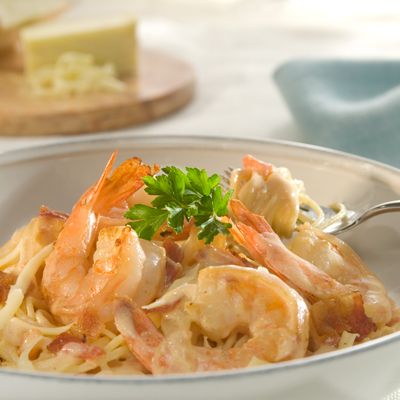 <p>Sautéing onions and shrimp in bacon drippings infuses this company-worthy fettuccine with a pleasant smoky flavor.</p><br /><p><b>Recipe:</b> <a href="/recipefinder/pink-shrimp-bacon-onions-recipe-btl0810" target="_blank"><b>Pink Shrimp with Bacon and Onions</b></a></p>