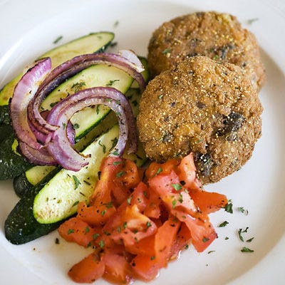 <p>Paired with some local greens, these lightly seared crab cakes make a healthy and soulful meal.</p><br /><p><b>Recipe:</b> <a href="/recipefinder/geechigirl-crab-cakes-recipe-opr0910" target="_blank"><b>Geechigirl Crab Cakes</b></a></p>