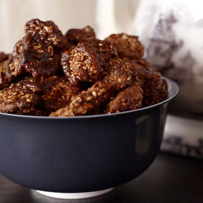 A gentle heat makes these seasoned walnuts ideal with cocktails.<br /><br /><b>Recipe:</b> <a href="/recipefinder/sweet-spicy-sesame-walnuts-recipe-fw1110" target="_blank"><b>Sweet-and-Spicy Sesame Walnuts</b></a>