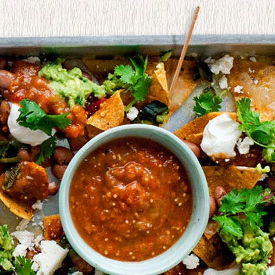 <p>A big plate of nachos offers lots of different flavors, so you can mix up a perfect bite of spicy, salty, and creamy.</p><br /> <p><b>Recipe:</b> <a href="/recipefinder/nachos-poblanos-fresh-salsa-guacamole-recipe-opr0211" target="_blank"><b>Nachos with Poblanos, Fresh Salsa, and Guacamole</b></a></p>
