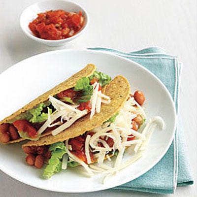 Pinto Bean and Cheese Tacos <p>During your next family taco night, go vegetarian with these filling pinto bean tacos.</p><br />
<p><b>Recipe:</b> <a href="/recipefinder/pinto-bean-cheese-tacos-recipe-rs0511" target="_blank"><b>Pinto Bean and Cheese Tacos</b></a></p>