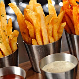 <p><b>Location:</b> Miami, FL<br />
<b>Website:</b> <a href="http://michaelmina.net/restaurants/locations/bsmi.php?restaurant_id=12" target="_blank">michaelmina.net</a><br />
<b>On the Menu:</b> Trio of Duck Fat Fries</p><br />

<p>Think all french fries are the same? Think again. At Bourbon Steak, Michael Mina's signature fries come in three mouthwatering presentations: 1. Fries are dusted with Spanish paprika and onion powder, then served with barbecue sauce. 2. Herb fries are dusted with garlic, rosemary, parsley, and chives, then served with onion ketchup. 3. A batch of truffle oil fries are served with truffle aioli. Your only problem is figuring out which batch to dig into first.</p>