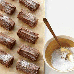 <p>Roll chocolate cookie dough into ropes, then cut them into mini logs to resemble the classic French <i>bûche de Noël</i> cake.</p>
<p><b>Recipe:</b> <a href="/recipefinder/baby-buche-de-noel-cookies-recipe-fw1211" target="_blank"><b>Baby Bûche de Noël Cookies</b></a></p>