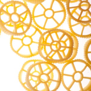 <p>Round and ridged on the outside and sectioned off on the inside, this type of pasta quite literally resembles a wagon wheel. A favorite of kids for its fun shape, this type is most often seen as a counterpart to vegetables or served in cold pasta salads. Also called rotelle, wagon wheels are usually sold dried. The individual pieces are about as big in diameter as a quarter.</p><br />
<p><a href=""/search/fast_search_recipes?search_term=wagon+wheels""><b>Find recipes with wagon wheels</b></a></p>
