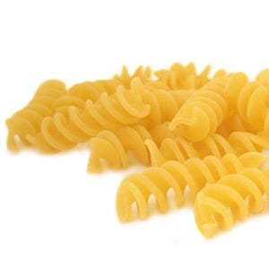 <p>This hearty spiral-shaped pasta, whose name means "little spindles," is often confused with rotini, which has a tighter coil and flatter edges — similar to the threads of a screw. In recipes, the two types are virtually interchangeable, pairing perfectly with thick sauces and vegetables, which the colis catch and hold. The springy pasta also serves as a substantial counterpart to seafood and holds up well in cold salads. Fusilli can be hollow, short or long.</p><br />
<p><a href="/search/fast_search_recipes?search_term=Fusilli"><b>Find recipes with fusilli</b></a></p>