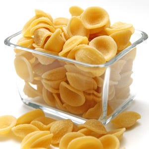 Pasta Orecchiette <p>Italian for "little ears," this cup-shaped pasta is perfect for holding thick sauces and chunky mix-ins from veggies to nuts to meat and herbs. Originally from the Puglia region of Italy, orecchiette is made by pressing a thumb onto small balls of pasta, resulting in a smooth interior and rough exterior. </p><br />
<p><a href="/search/fast_search_recipes?search_term=orecchiette""><b>Find recipes with orecchiette</b></a></p>