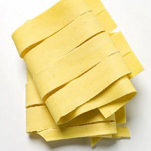 <p>Made by cutting fresh sheets of pasta dough with a cutting wheel, pappardelle is wide, flat ribbons of fresh pasta ranging from 1 to 2 1/4 inches in width. It is sold dried or fresh, and is typically served with hearty meats like duck or wild boar and mushroom sauces.</p><br />
<p><a href="/search/fast_search_recipes?search_term=pappardelle"><b>Find recipes with pappardelle</b></a></p>