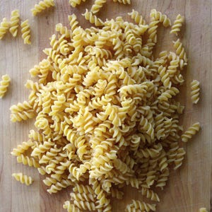 pasta-rotini-xl.jpg "<p>Similar to fusilli, but with a tighter spaces between the grooves (and never hollow), rotini is a hearty, spiral-shaped pasta that resembles the threads of a screw. Most often used with pesto or tomato-based sauces, rotini is also ideal for cold salads.</p><br />
<p><a href=""/search/fast_search_recipes?search_term=rotini""><b>Find recipes with rotini</b></a></p>"