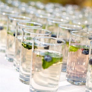 <p>Make sure you've got a few nonalcoholic options (especially if it's an outdoor summer wedding). For hotter months, try water infused with cucumber, melon, mint, and loads of crushed ice. During the winter, serve hot apple cider with cinnamon sticks.</p><br />
<p><b>Top-Shelf Idea</b></p>: Give guests more than just water and soda by having at least one mocktail on the menu. Work with your caterer or mixologist to come up with something inventive — like a mix of grapefruit and orange juices, a little coconut milk, and a small scoop of orange sherbet on top.
