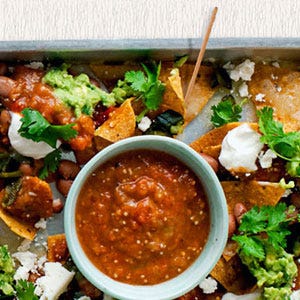 <p>A big plate of nachos offers lots of different flavors, so you can mix up a perfect bite of spicy, salty, and creamy.</p><br /> <p><b>Recipe:</b> <a href="/recipefinder/nachos-poblanos-fresh-salsa-guacamole-recipe-opr0211" target="_blank"><b>Nachos with Poblanos, Fresh Salsa, and Guacamole</b></a></p>