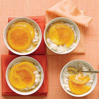 <p>Thinly sliced oranges are candied in a honey syrup that lends them a faint floral perfume. The sweet citrus slices sit atop a contemporary version of rice pudding, which is made from starchy, short-grain Arborio rice to yield a texture that's exceptionally rich. Heavy cream, whipped to soft peaks, is folded in just before serving to ensure a light consistency.</p>
<p><strong>Recipe:</strong> <a href="../../../recipefinder/vanilla-rice-puddings-glazed-oranges-recipe-mslo0213" target="_blank"><strong>Vanilla Rice Puddings with Glazed Oranges</strong></a></p>
