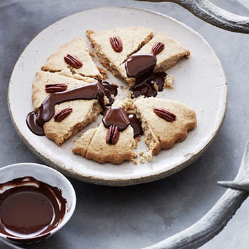 <p>"This shortbread gives you a pecan-and-chocolate fix without all the work of making a pie," says F&W's Marcia Kiesel, who developed the incredibly easy recipe. </p>
<p><b>Recipe: <a href="http://gogonow.org/recipefinder/pecan-shortbread-chocolate-drizzle-recipe-fw0913%22 target="_blank">Pecan Shortbread with Chocolate</a></b></p>