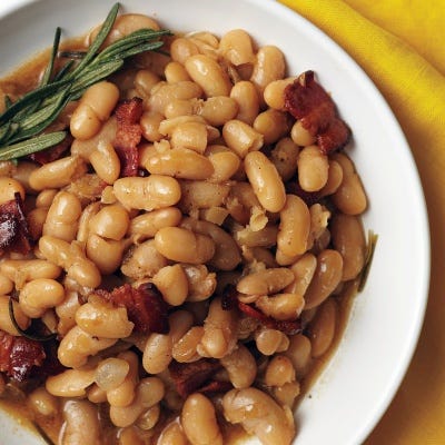 <p>These white beans are baked in ale for ultimate flavor. A pale ale, such as Blue Moon or Hoegaarden, works best for this recipe.</p>
<p><strong>Recipe:</strong> <a href="http://gogonow.org/recipefinder/beer-baked-white-beans-recipe-mslo0913%22%3E%3Cstrong%3EBeer-Baked White Beans</strong></a></p>