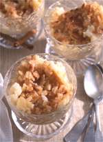 Reminiscent of crème brûlée, this creamy rice pudding is topped with a maple, brown sugar, and macadamia-nut mixture that gives the dessert a brittle-like finish. As your spoon cracks through the crunchy topping, each bite offers an appealing contrast of delicious textures.