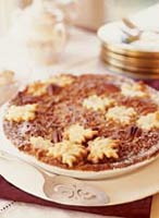 Chocolate Bourbon Pecan Pie mixes two all-time favorites: the rich, gooey texture of a pecan pie with the seductive sweetness of chocolate.