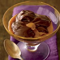 This rich, creamy pudding calls for both dark chocolate and cocoa powder. For mocha pudding, heat milk and steep with 1/2 cup crushed coffee beans for 10 minutes. Strain and proceed with recipe.