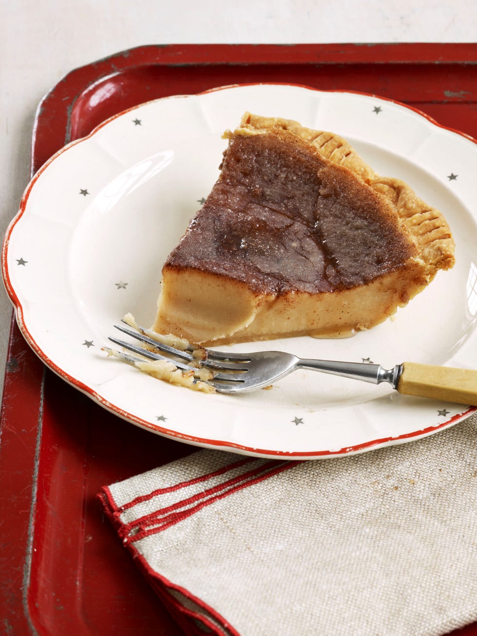Introduced by Quaker homesteaders in the early 1800s, this humble Midwestern
standard—made with heavy cream, flour, sugar, vanilla, and milk—never fails to satisfy the loyal patrons of Nick's Kitchen, a 102-year-old institution in downtown
Huntington, Ind.
<br /><br /><strong>Recipe:</strong> <a href="http://www.countryliving.com/recipefinder/hoosier-sugar-cream-pie-recipe-clv0510?click=recipe_sr" target="_blank">Hoosier Sugar Cream Pie</a>