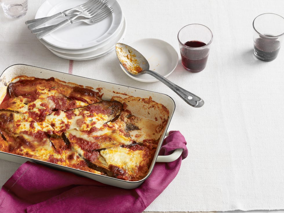 <p>This "lasagna" recipe cuts out the noodles altogether and uses fresh summer eggplant instead. Eggplant slices, instead of noodles, plus low-fat cheeses save 212 calories, 4 grams of fat, and 33 carbs per serving.</p>
<p><strong>Recipe:</strong> <a href="http://www.countryliving.com/recipefinder/eggplant-lasagna-recipe-clx0411" target="_blank">Eggplant Lasagna</a></p>